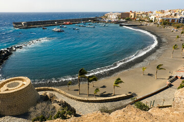 Playa San Juan with view of the port on the island of Tenerife - 744818331