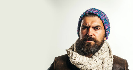 Serious bearded man in fashionable clothing. Handsome male model in stylish leather jacket,...