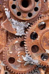 rusty gears and working mechanism of a diesel engine after a fire