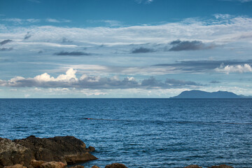 Relax and unwind at Yorkeys Knob Beach, Queensland, where golden sands meet the turquoise waters of the Coral Sea.