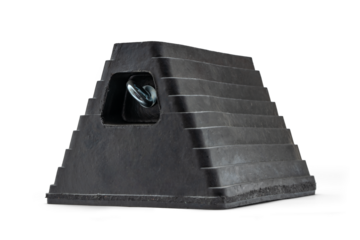 Heavy-Duty Industrial Rubber Wheel Chock for Secure Vehicle Stabilization - Durable and Weather-Resistant for Trucks, Trailers, and Equipment Isolated with transparent shadow