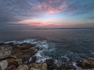 Dusk's Palette Over Rugged Shoreline