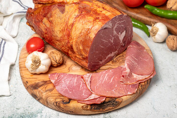 Smoked ribeye. Delicious cold smoked ribeye on cutting board. Close up