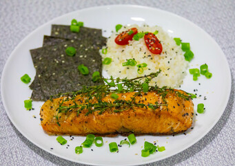 Salmon fish grilled in butter and olive oil