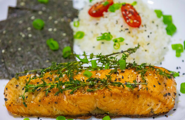 Salmon fish grilled in butter and olive oil
