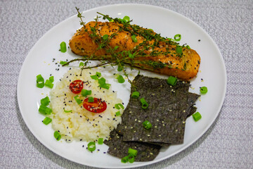 Salmon fish grilled in butter and olive oil