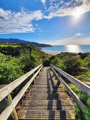 Experience the laid-back charm of Raglan Beach, renowned for its surfing, scenic beauty, and relaxed coastal atmosphere in New Zealand.