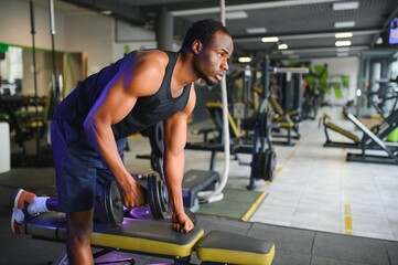 African American man working out in the gym.