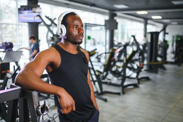 Fototapeta na wymiar Black African American young man at the gym