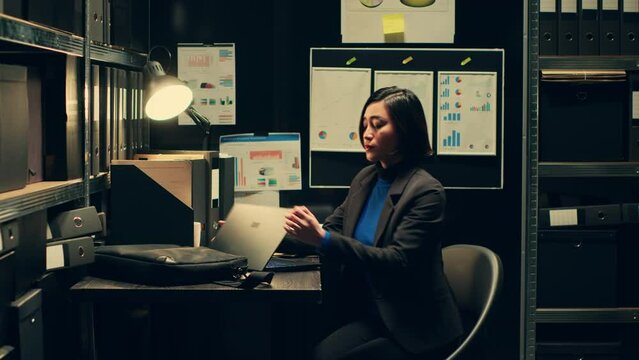 Private detective developed profiles of suspects based on archived information, finishing cross reference examination. Law agent starting field work and surveillance to catch culprit. Camera A.