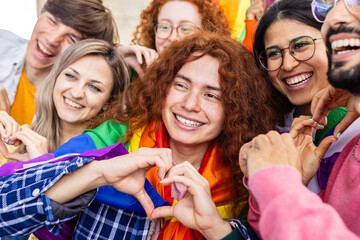 Diverse young people having fun together celebrating gay pride festival day. LGBT community concept.