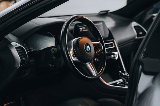 Photo of BMW G14 G15 G16 8 Series. They show details of the car with an electronic display, steering wheel, performance seats, lights and the car.