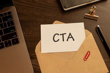 There is word card with the word CTA. It is an abbreviation for Call To Action as eye-catching image.