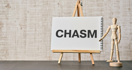 There is notebook with the word CHASM. It is as an eye-catching image.