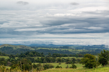 Obraz premium Stunning scenery in Northern New South Wales, Australia, featuring rolling hills, lush farmlands, dense forests, and serene views, offering a perfect blend of nature and tranquility