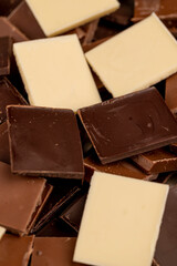white, bitter and milk chocolate pieces