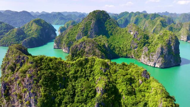 scenic drone shot of Unesco World Heritage sight, Halong Bay in Vietnam, iconic Halong Islands drone shot. Vacation travel in Vietnam