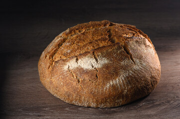 appetizing homemade whole grain bread on a wooden table 9