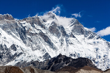 South Face of Mount Lhotse in Himalayas. High and steep mountain wall in Nepal. View from Chukhung valley on everest base camp trek near mt. Imja Tse (Island Peak).