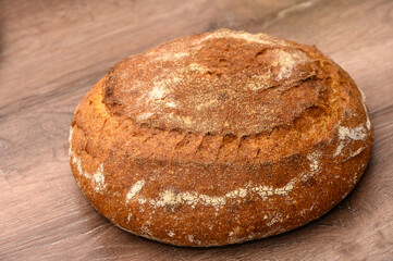 appetizing homemade whole grain bread on a wooden table 5