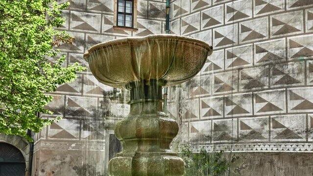 Fountain in Nachod Castle. Nachod Chateau in East Bohemian town of Nachod of same name originated from former border castle. It has been protected as national cultural monument of Czech Republic.