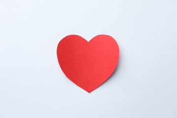 One paper heart on white background, top view