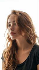 Obraz premium Elegant Young Woman with Natural Makeup and Flowing Hair Portrait