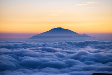 Golden Horizon: A Majestic Sunset Over Mt. Meru