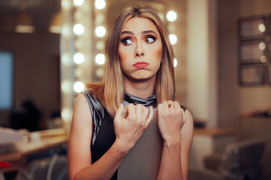 Confused Hairstylist Checking her Appointments in pc Tablet. Busy Overwhelmed Hair Salon Worker Checking Booking List 
