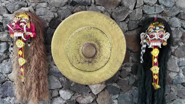 Traditional Leak Rangda Mask costume for a Bali Dance theater performance. Handcrafted masks in the form of legendary demons in Bali, Indonesia.
