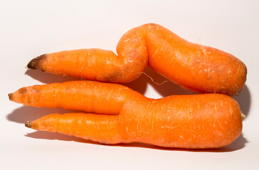 Two crooked carrots are mutants. Association of erotic intimacy.