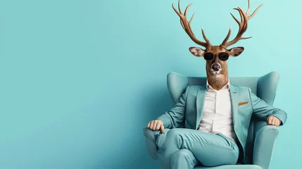 Cercles muraux Cerf A humorous and surreal image of a deer dressed in a business suit and sunglasses, seated confidently in an armchair.