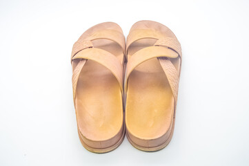 A pair of light brown girls' sandals looks sexy