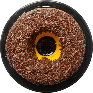 Carrot cake topped with brigadeiro and sprinkles isolated with cut out background.