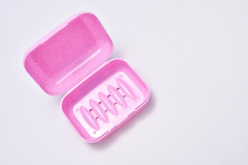 purple plastic bath soap container isolated on white background