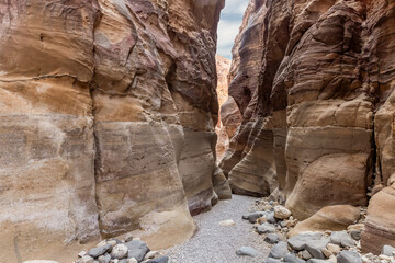 The bizarre beauty of the high mountains on the sides of the gorge of the tourist route of the gorge Wadi Al Ghuwayr or An Nakhil and the wadi Al Dathneh near Amman in Jordan