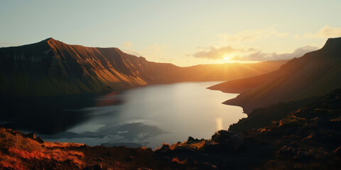 Naklejka premium Serene Reflections: A Majestic Mountain Lake at Sunset