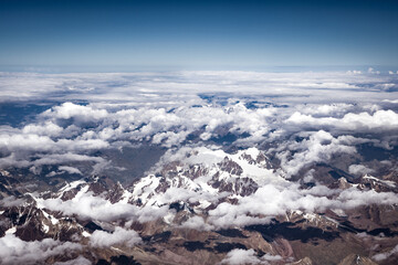 Obraz premium Aerial top view of brown snow covered Himalayan range from an air plane in Ladakh