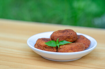 Perkedel or bergedel is a typical Indonesian dish made from potatoes, either fried or boiled before being mashed. They are then mixed with minced meat, sliced ​​scallions, celery leaves, and seasoning