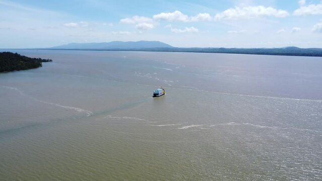 Ferries carrying passengers pass through the Kalimantan Sea