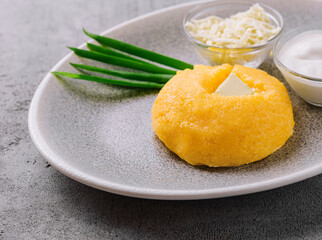 polenta with onions, feta cheese and sour cream
