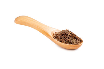 Seeds of dry cumin seasoning on a wooden spoon isolated on a white background