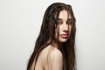 Naklejka premium beautiful girl with wet hair. young woman Beauty Portrait