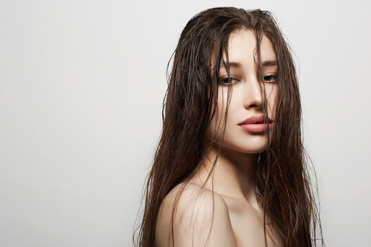 beautiful girl with wet hair. young woman Beauty Portrait