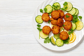 fried rice cutlets, rice tikki on white plate