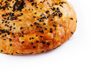 Fresh twisted bun with sesame seeds