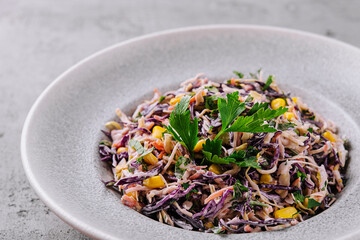 Fresh red cabbage salad with corn