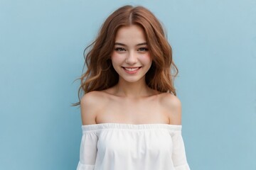 Beautiful ginger woman wearing a white off-shoulder smiling against a blue background with copy space.