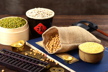 A scene of abundant crops on a retro wooden background. The meaning of the Chinese characters in...