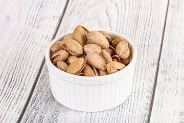 Salted tasty pistachio nuts heap